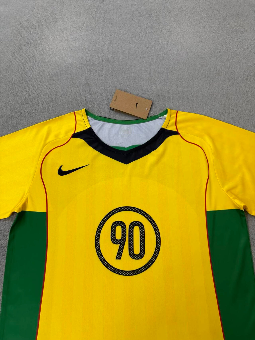 Camiseta Nike T90 Amarilla 2025