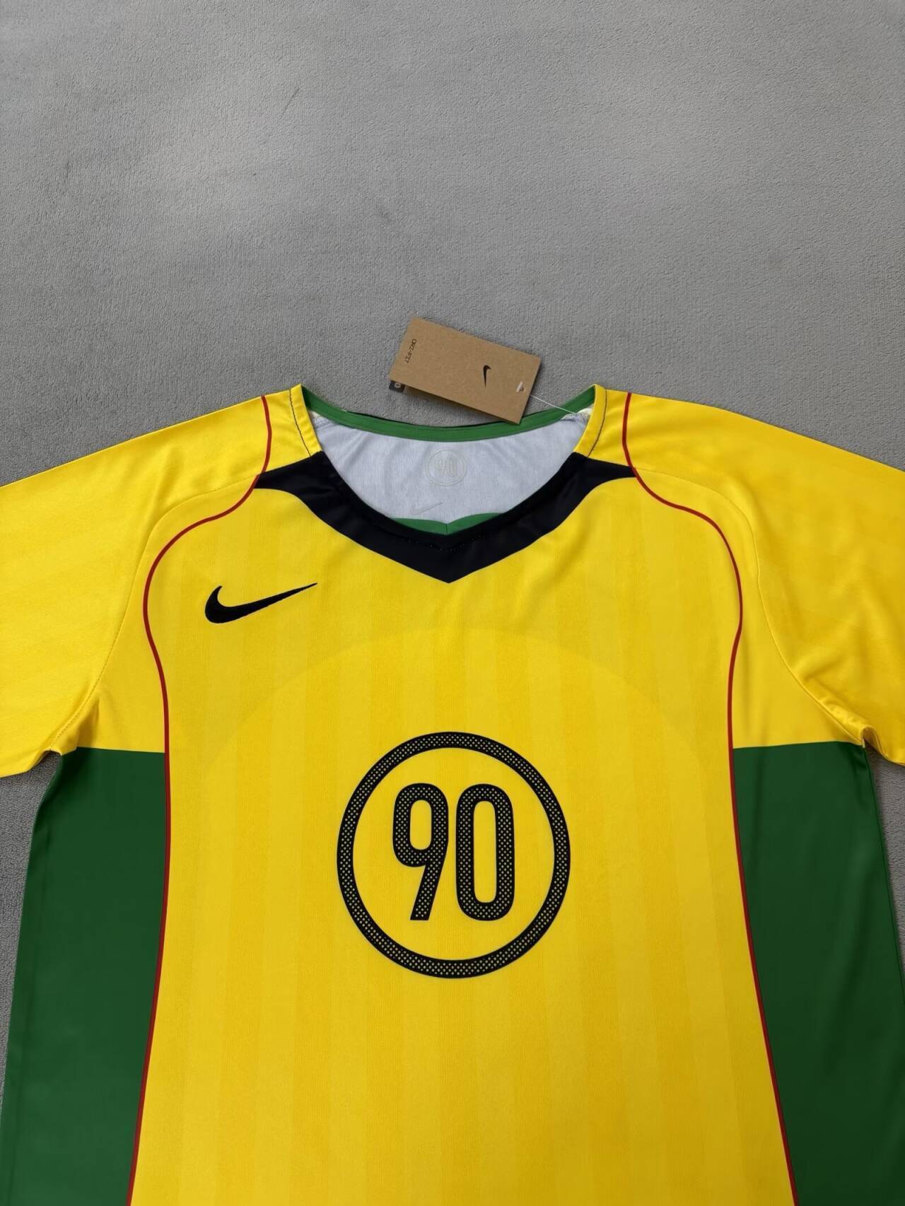 Camiseta Nike T90 Amarilla 2025