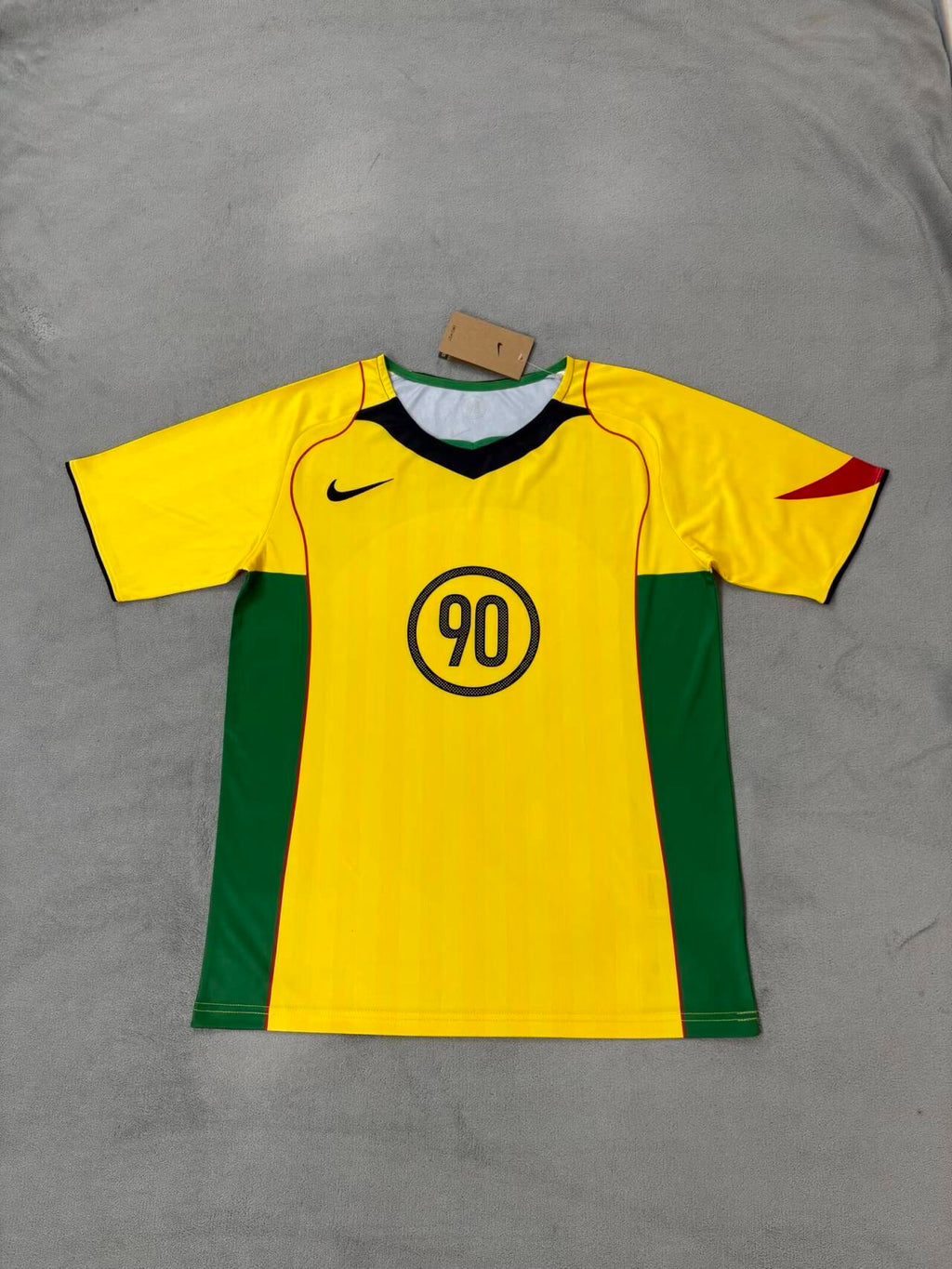Camiseta Nike T90 Amarilla 2025