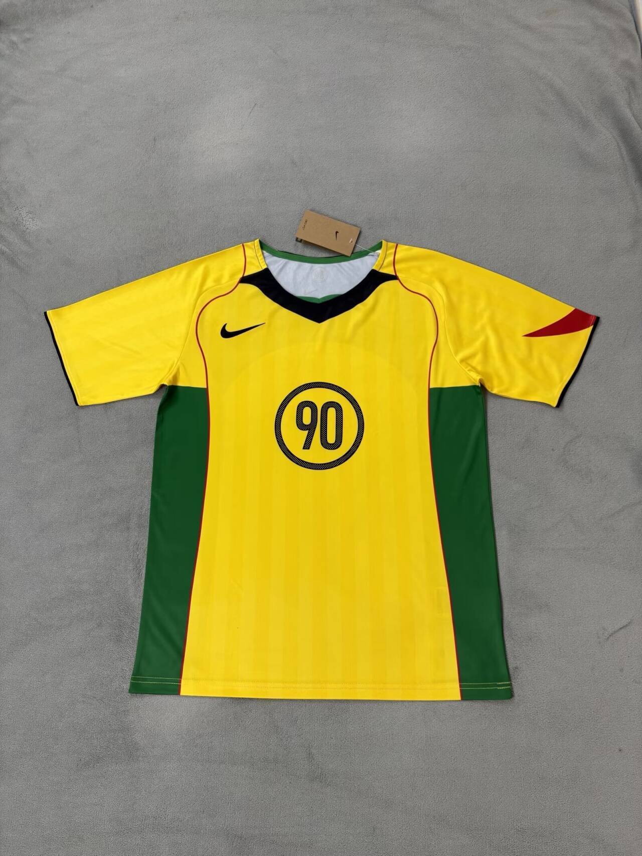 Camiseta Nike T90 Amarilla 2025